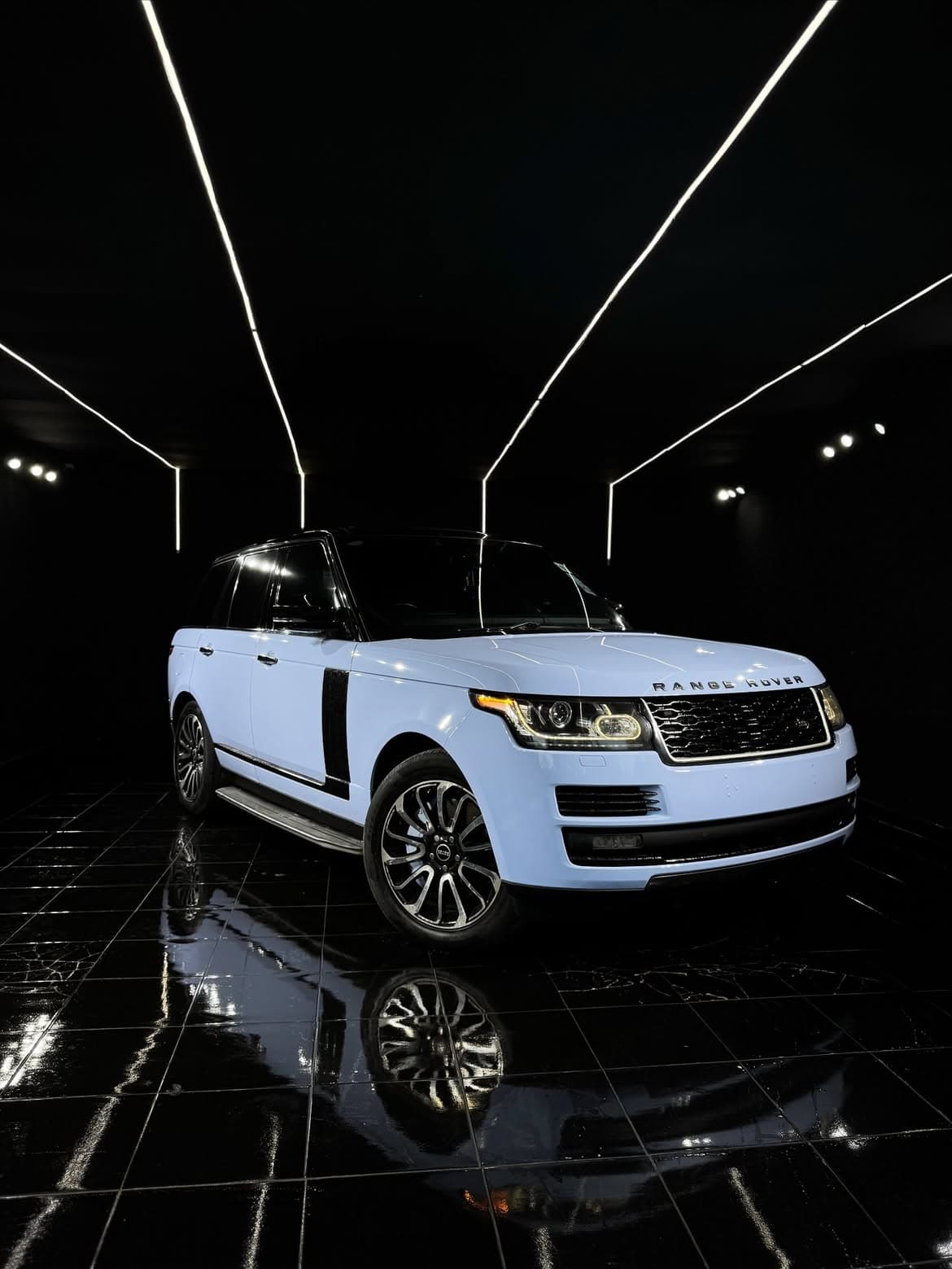Range Rover Mist Blue wrap — studio three-quarter